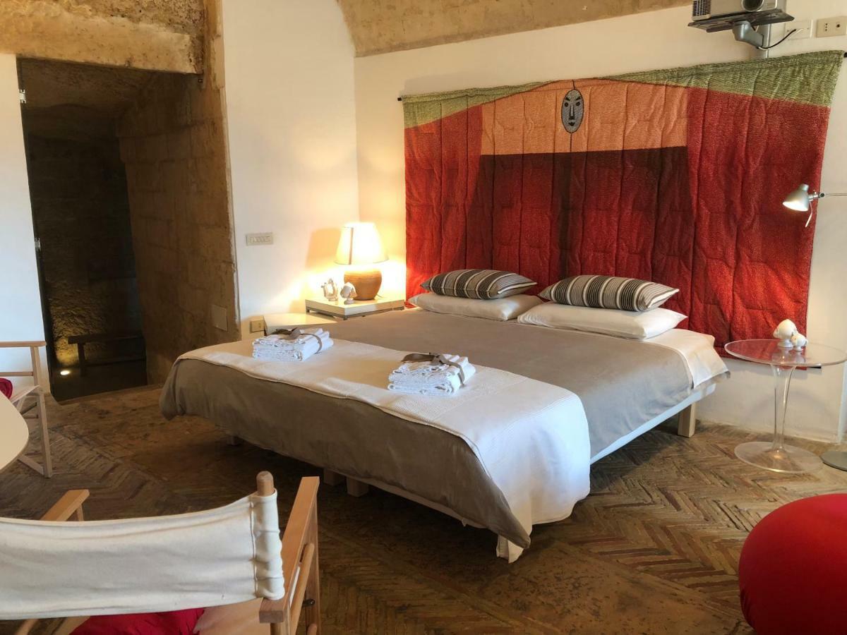 Gli Ipogei Nel Cuore Di Matera Villa Bagian luar foto